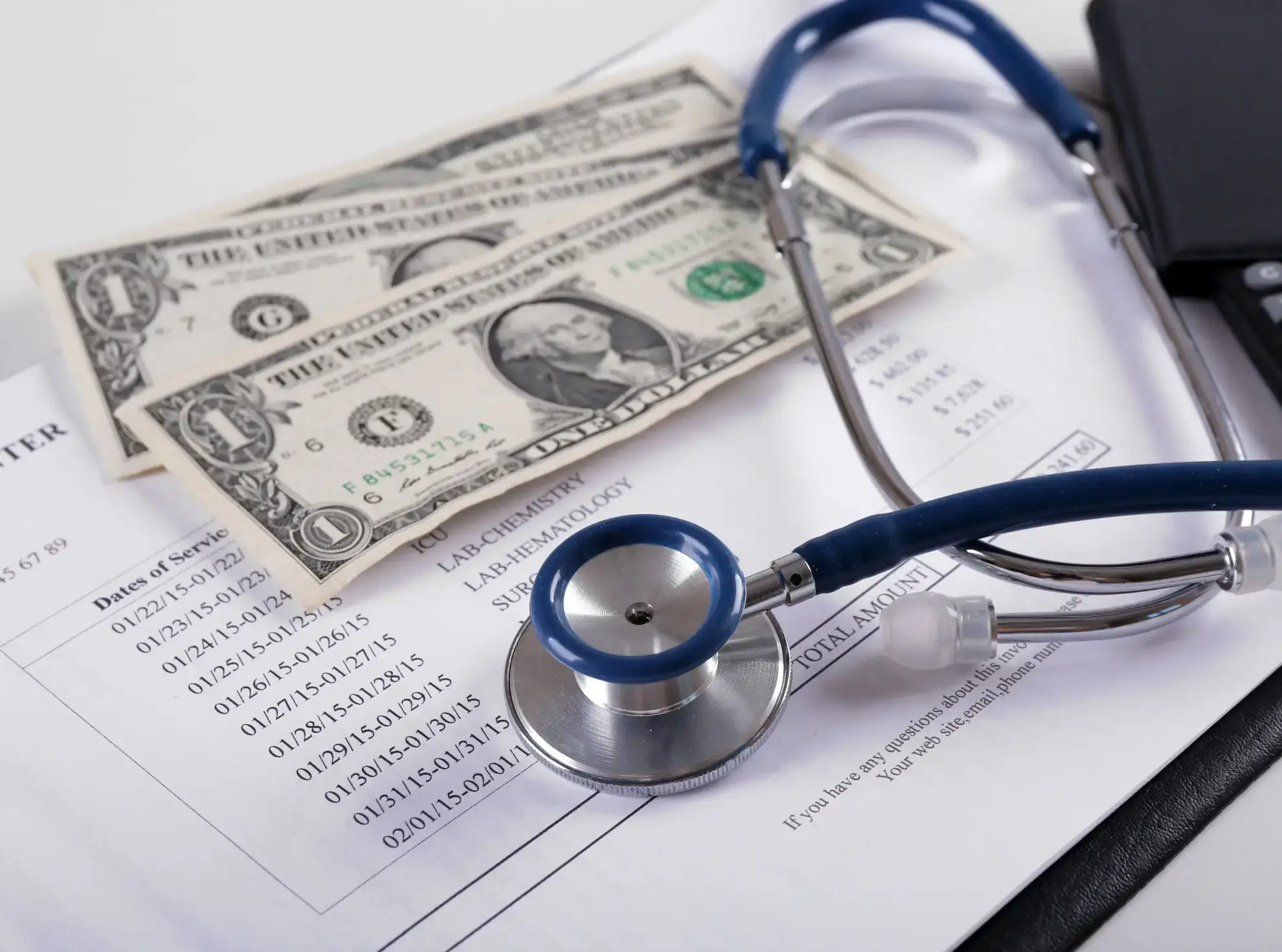 A stethoscope rests on a medical bill with money, showing the costs of studying MBBS in Malaysia for Indian students.